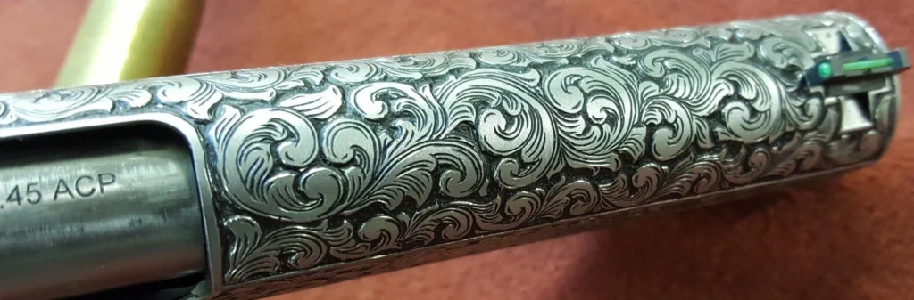 Custom gun engraving by Gus's Guns 4