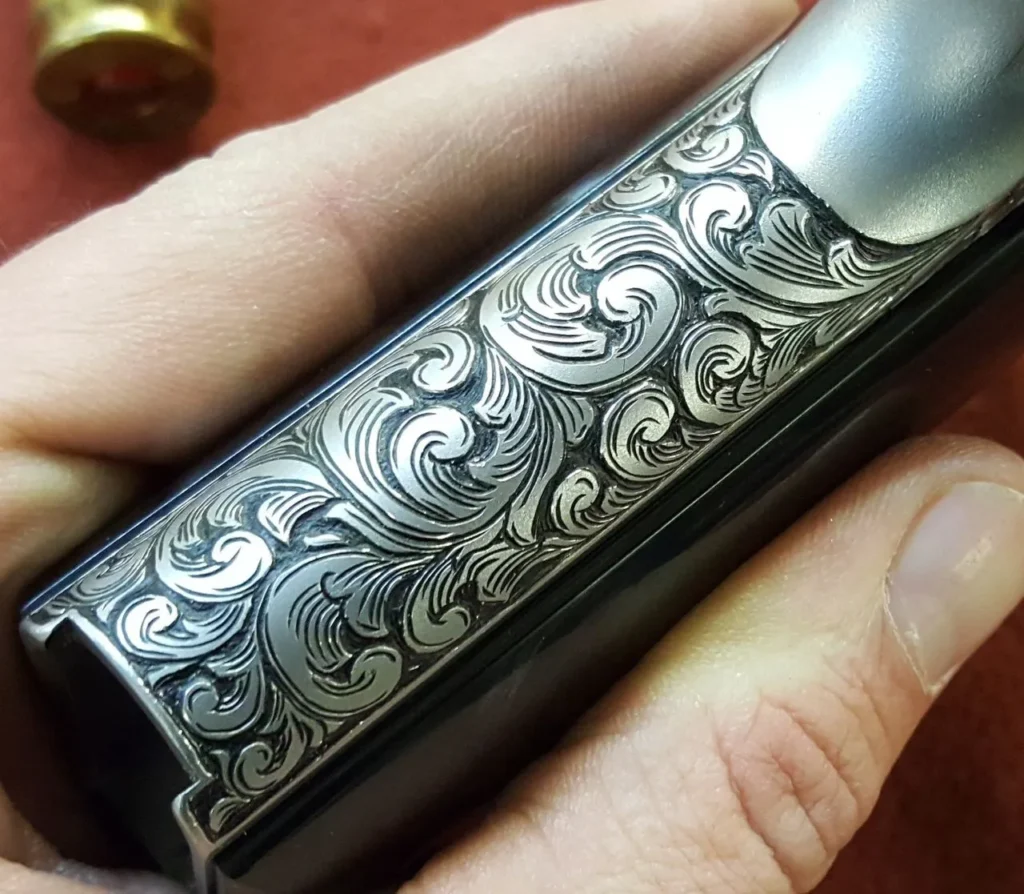 Custom gun engraving by Gus's Guns 5