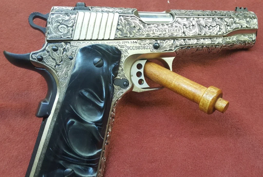 Custom gun engraving by Gus's Guns 7