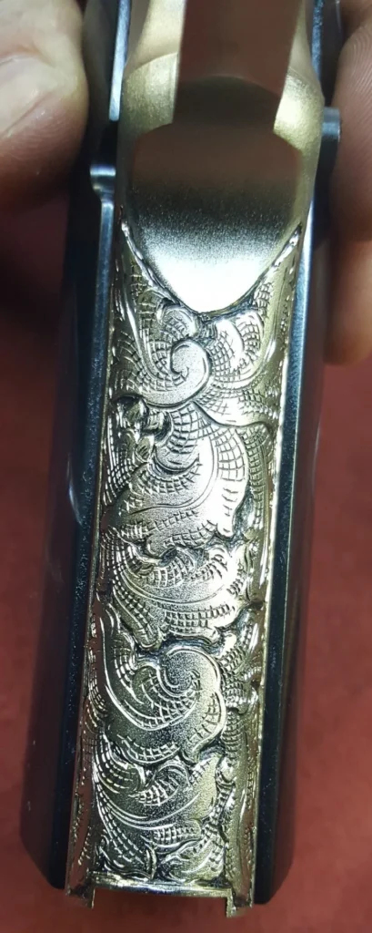 Custom gun engraving by Gus's Guns 8